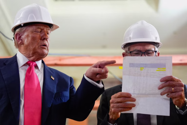 Donald Trump y Jerome Powell